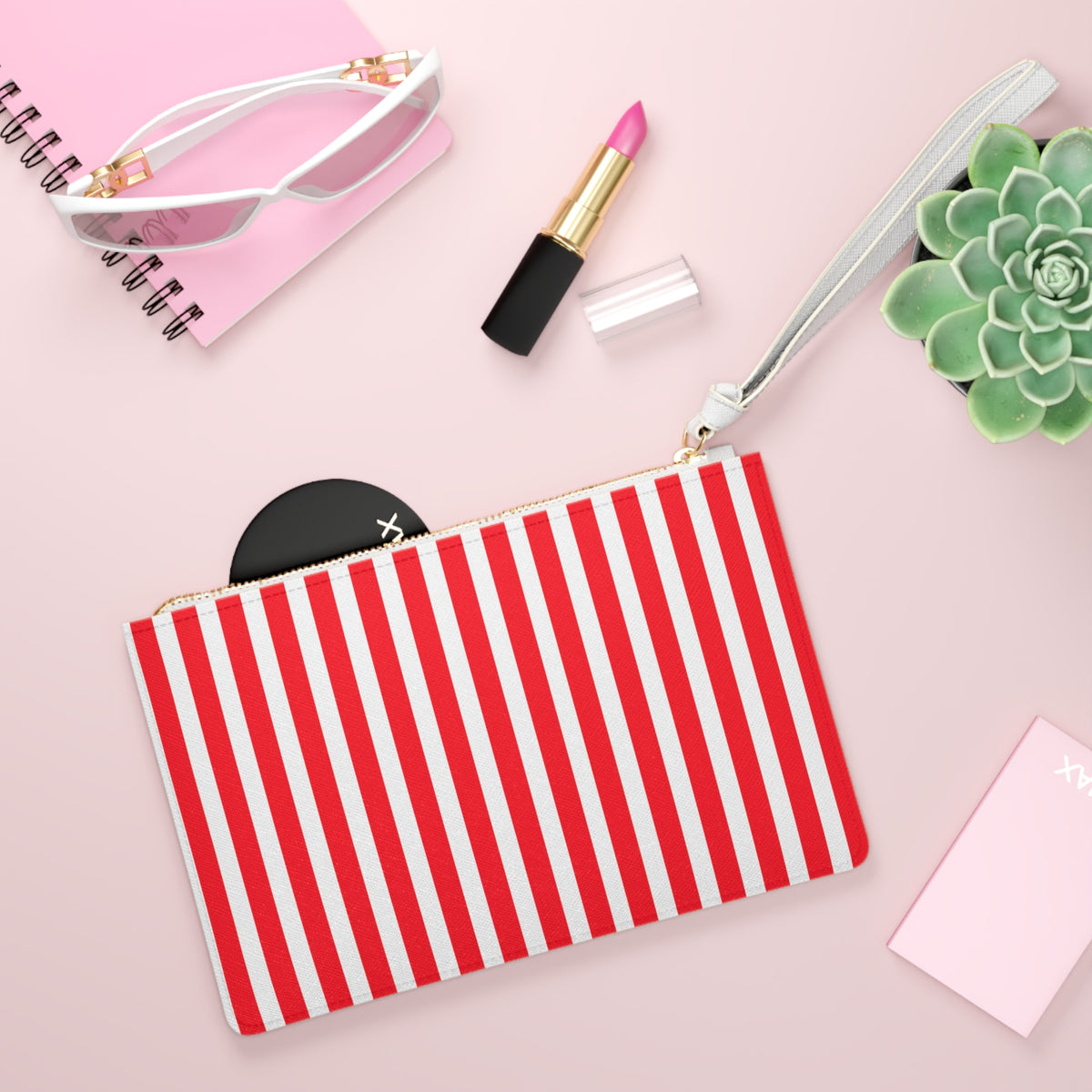 Red and white vertical stripe clutch bag with gold zipper pull nautical summer wristlet design