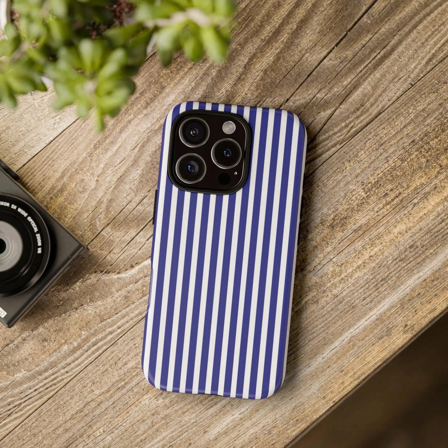 Back side of a navy blue and white striped tough phone case with a hard shell design for phone protection