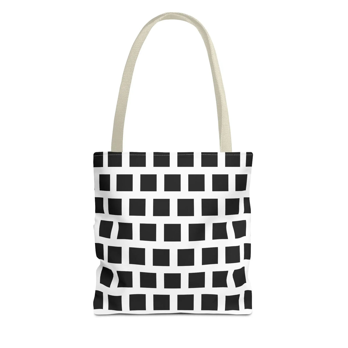 White canvas tote bag with black square pattern and cream-colored handles for versatile and durable use