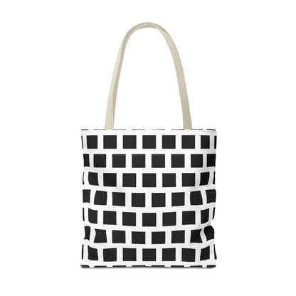 A white canvas tote bag with a black square pattern and light beige handles perfect for everyday use