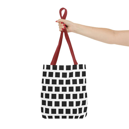 Black and white canvas tote bag with black square pattern and red fabric handles versatile and durable shoulder bag