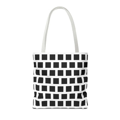 White canvas tote bag with black square pattern and matching white handles for versatile shoulder use