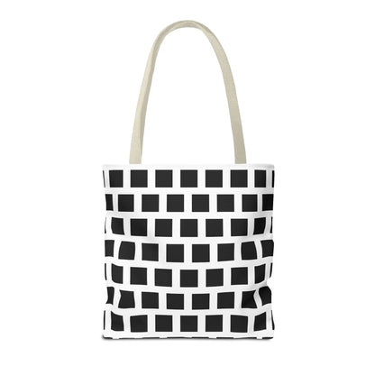 White canvas tote bag with black square pattern and off-white fabric handles for versatile shoulder use