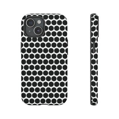 Black white dot pattern tough phone case with sleek modern design shown from the back for iphone samsung google