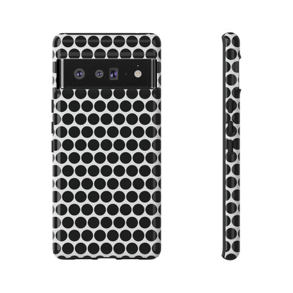 Black white dot pattern tough phone case with sleek modern design shown from the back for iphone samsung google