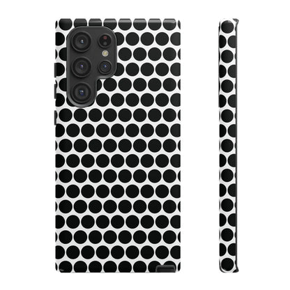 Black white dot pattern tough phone case with sleek modern design shown from the back for iphone samsung google
