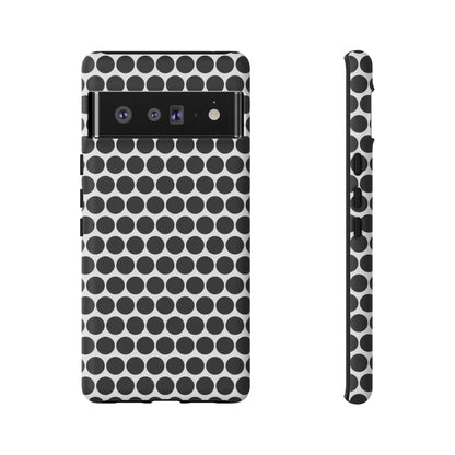 Black white dot pattern tough phone case with sleek modern design shown from the back for iphone samsung google