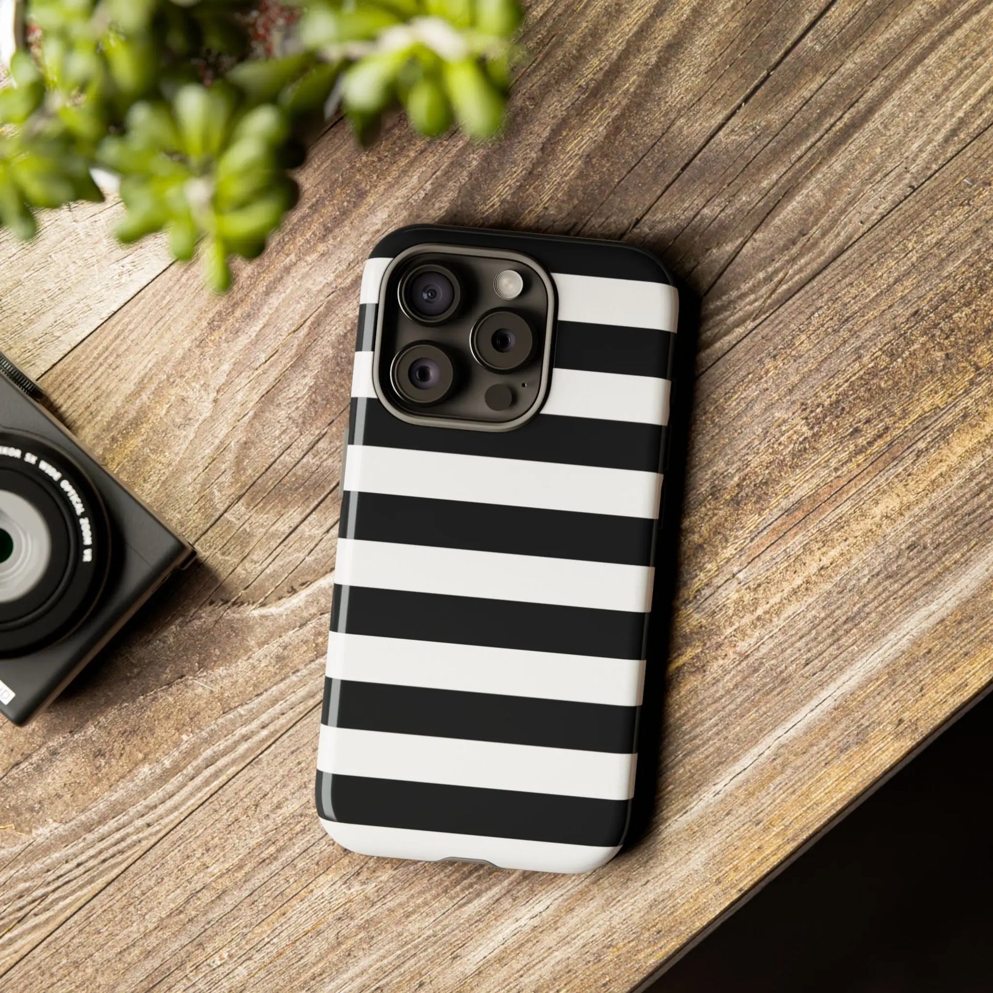 Black white stripe phone case with sleek modern design showing the back side compatible with iphone samsung pixel