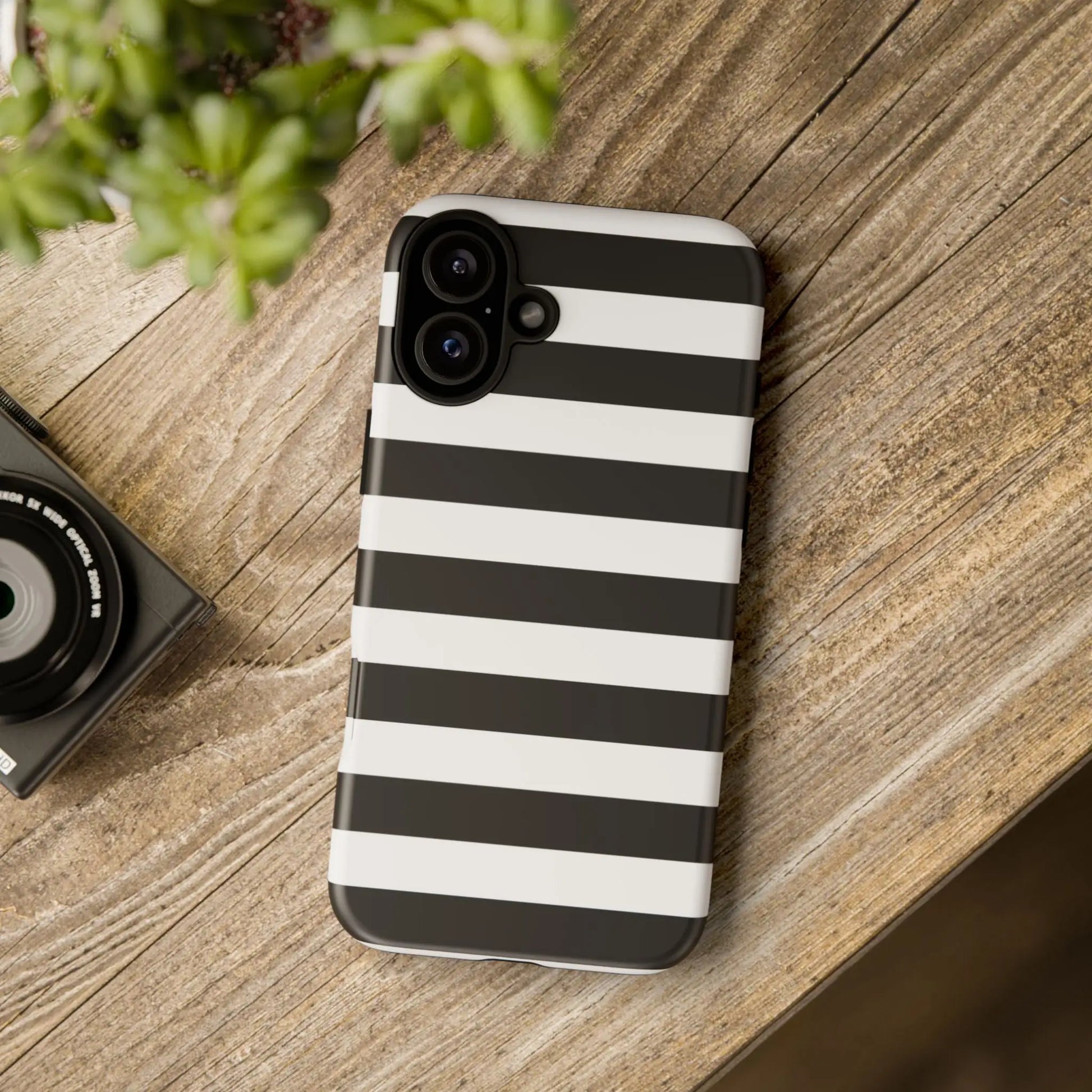 Back side of a sleek black white stripe phone case for iphone samsung s and google pixel phones with modern design