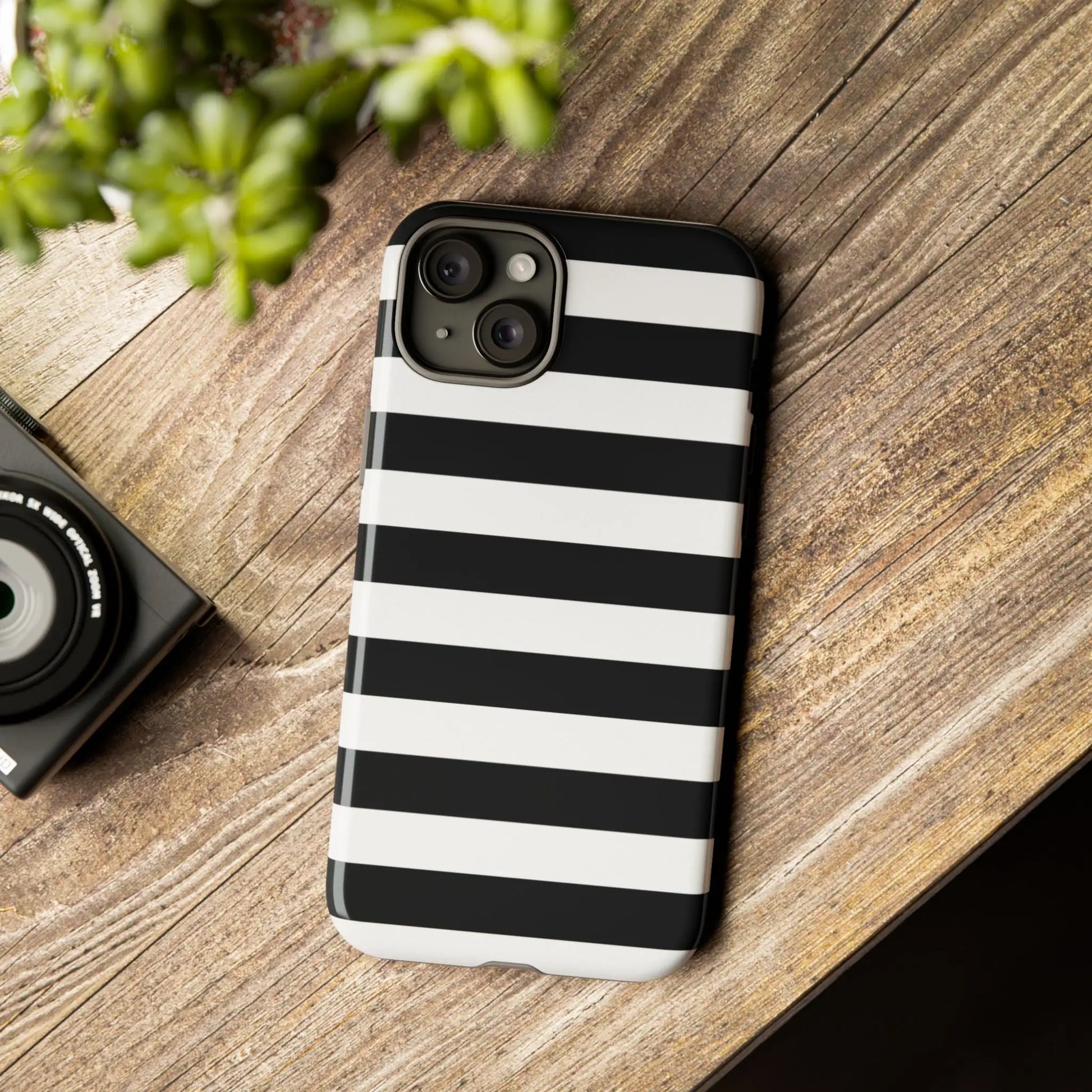 Back side of a black white stripe phone case with sleek modern design for iphone samsung s and google pixel phones