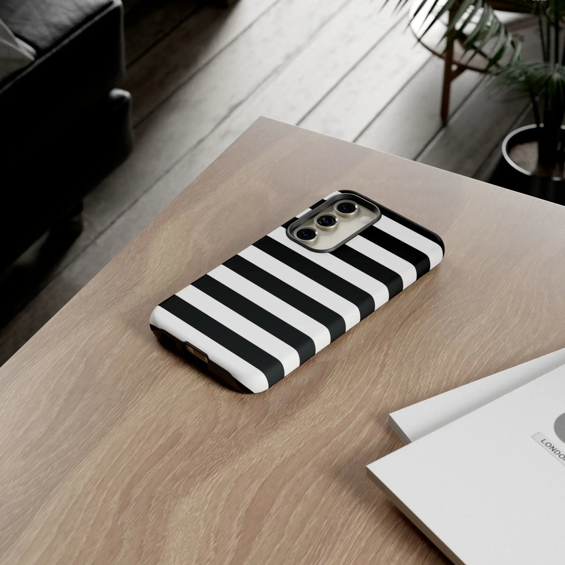 Black white stripe phone case showing the back side with sleek modern design for iphone samsung and google pixel phones