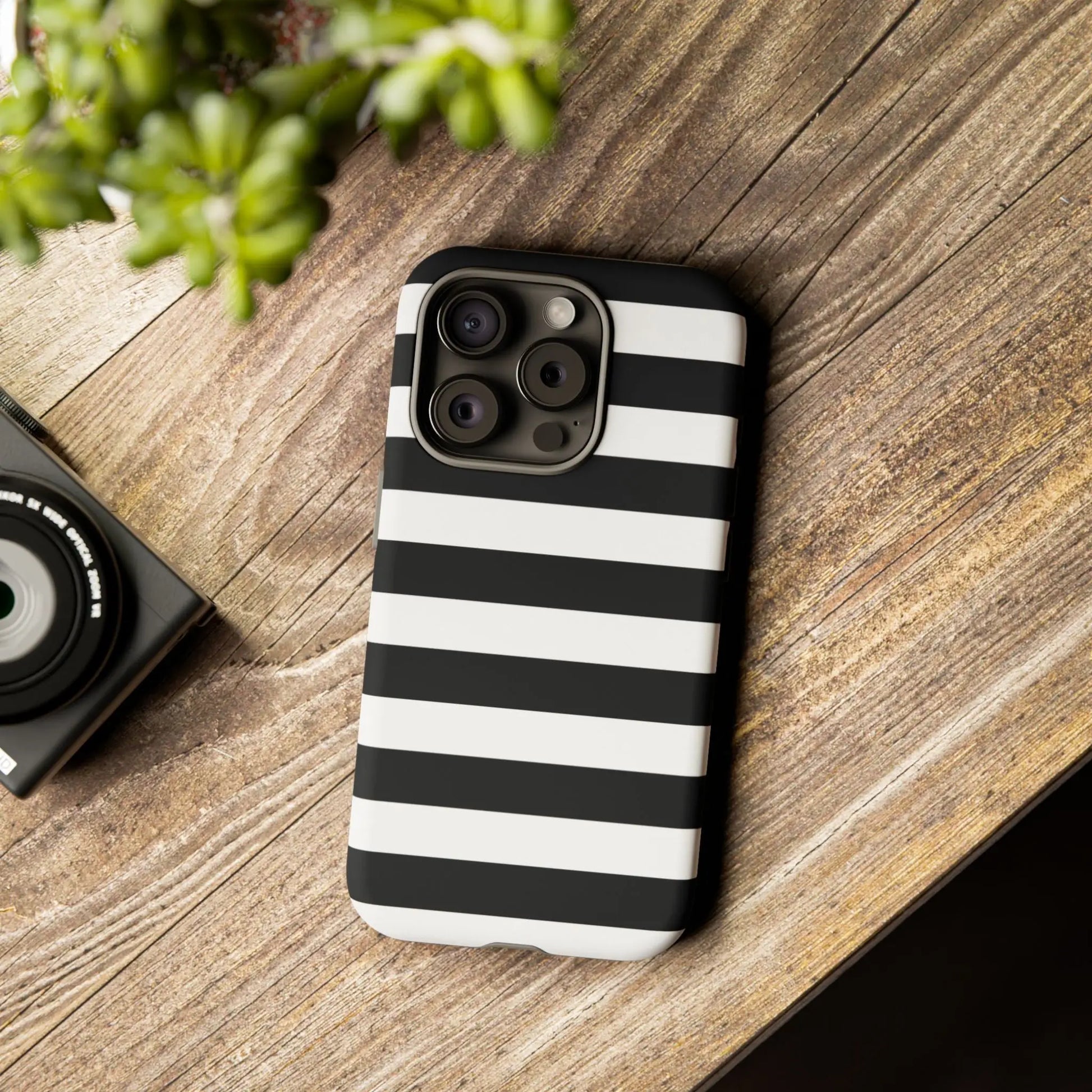Back side of a black white stripe phone case with sleek modern design for iphone samsung s and google pixel phones
