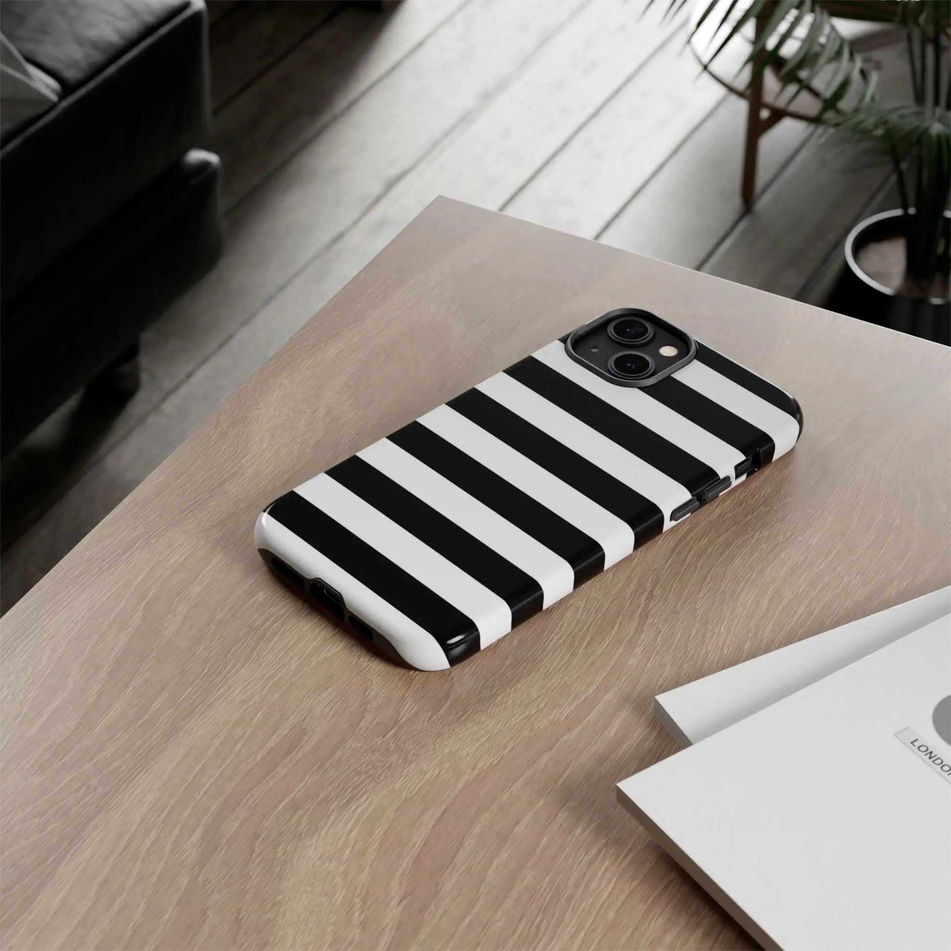 Black white stripe phone case with sleek modern design shown from the back for iphone samsung pixel phones