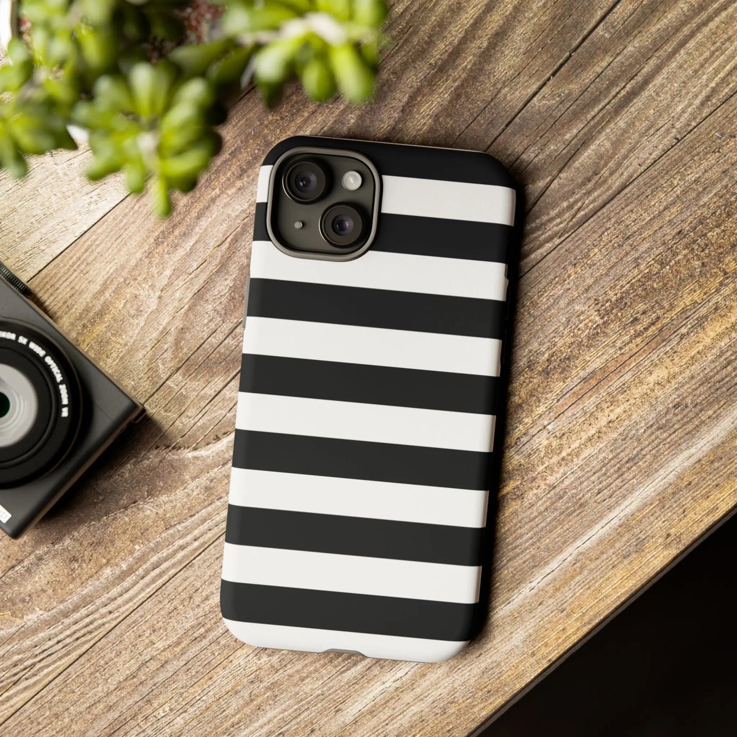 Back side of a sleek black white stripe phone case with horizontal stripes for iphone samsung s and google pixel phones