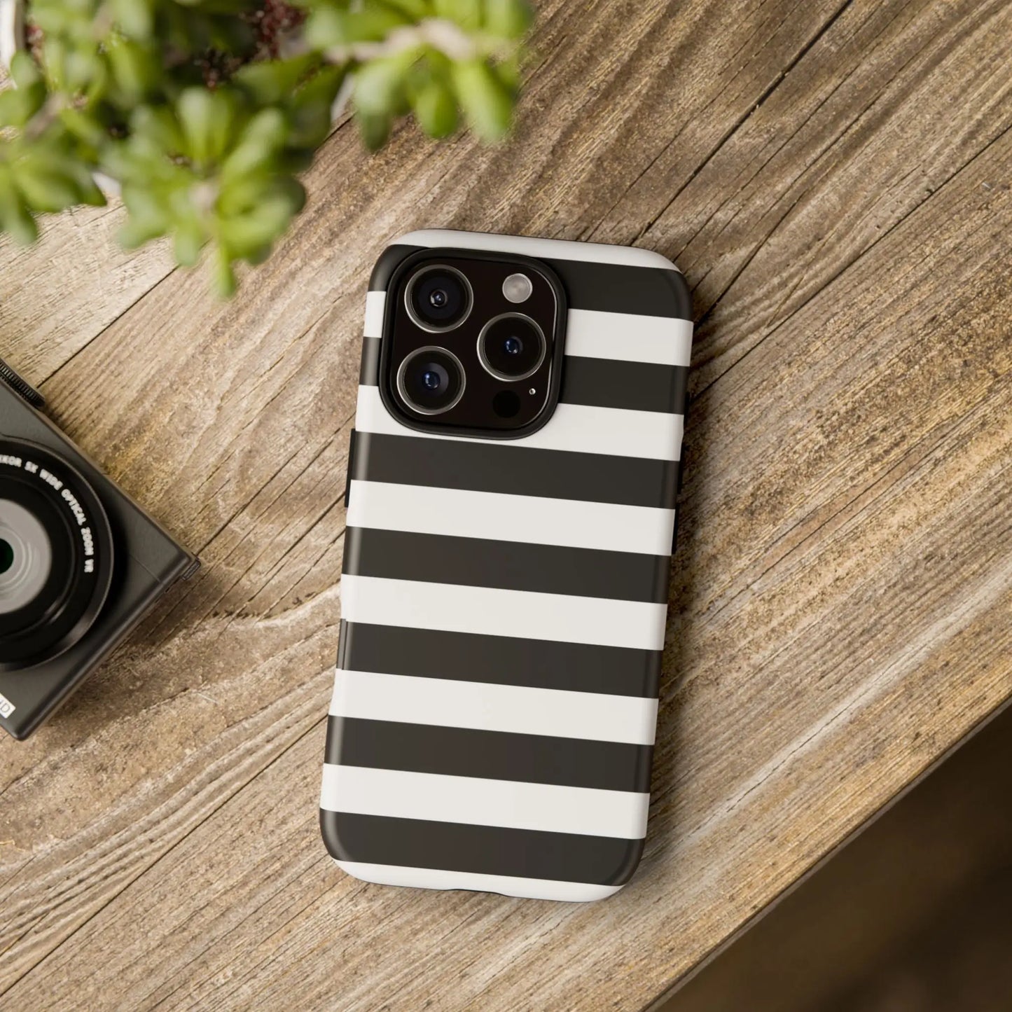 Black white stripe phone case for iphone samsung and google pixel with sleek modern design shown from the back side