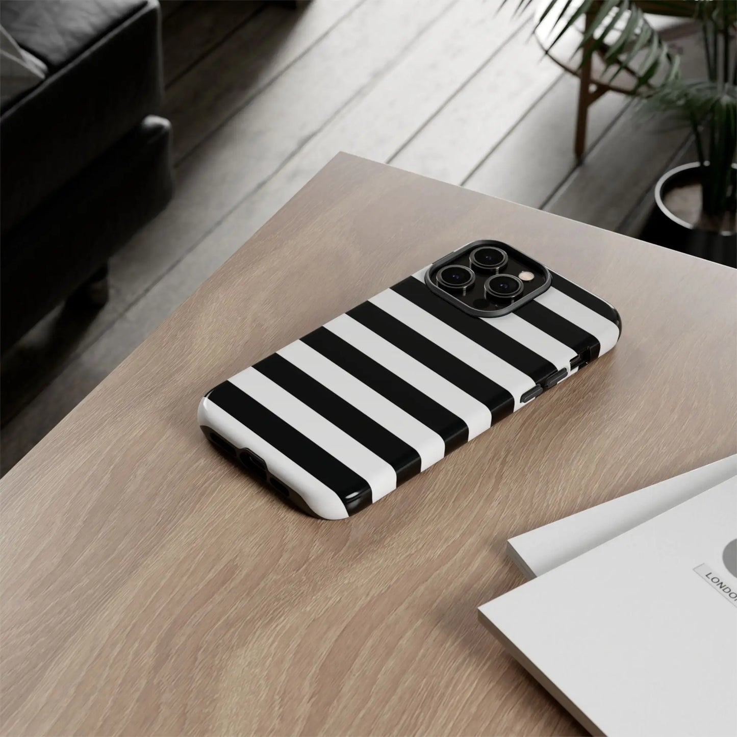 Black white stripe phone case with sleek modern design shown from the back for iphone samsung pixel phones