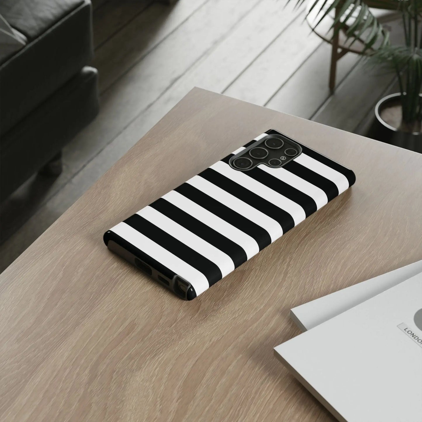 Black white stripe phone case with sleek modern design shown from the back for iphone samsung and google pixel phones