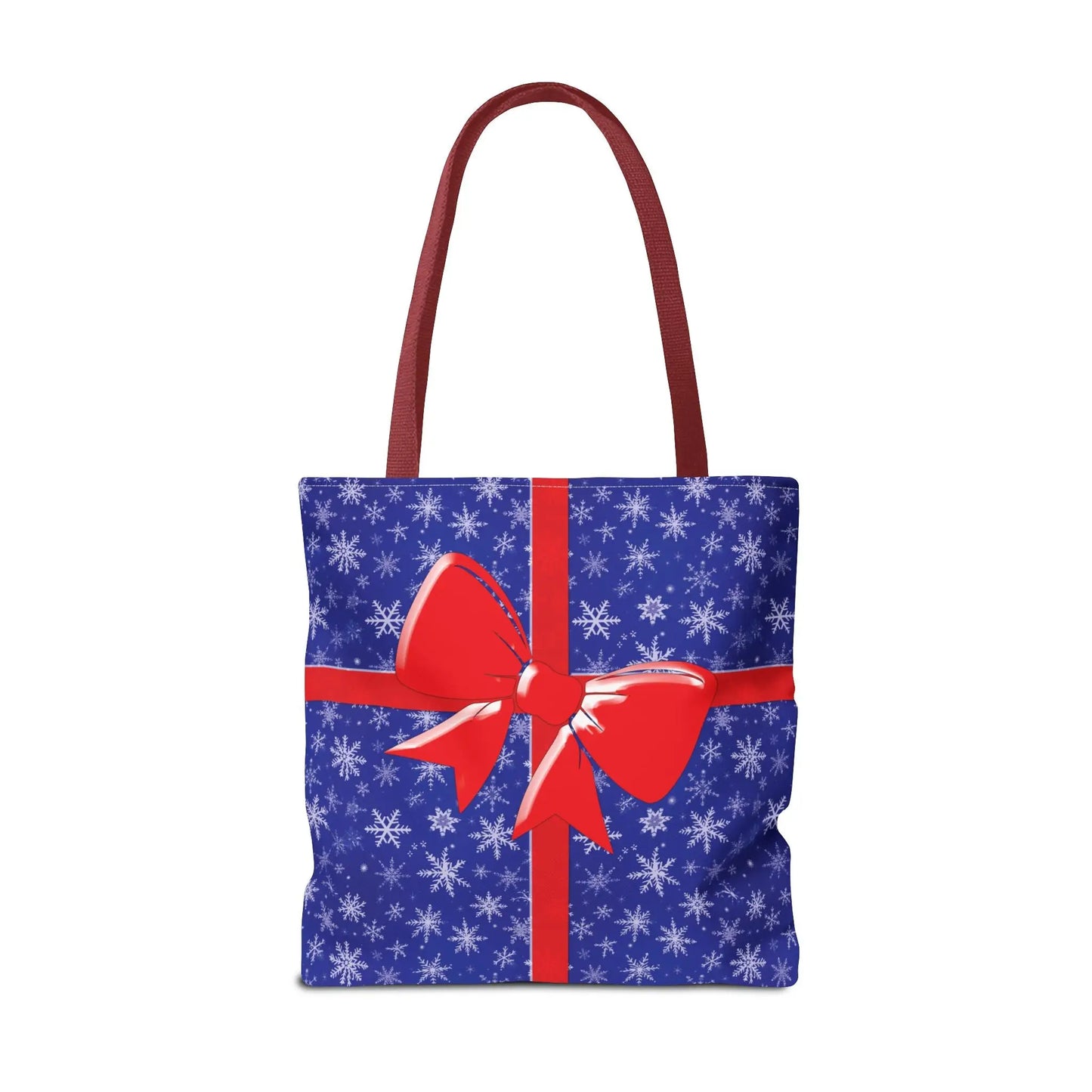 Blue christmas tote bag with white snowflake pattern, red bow design, and matching red handles for holiday shopping