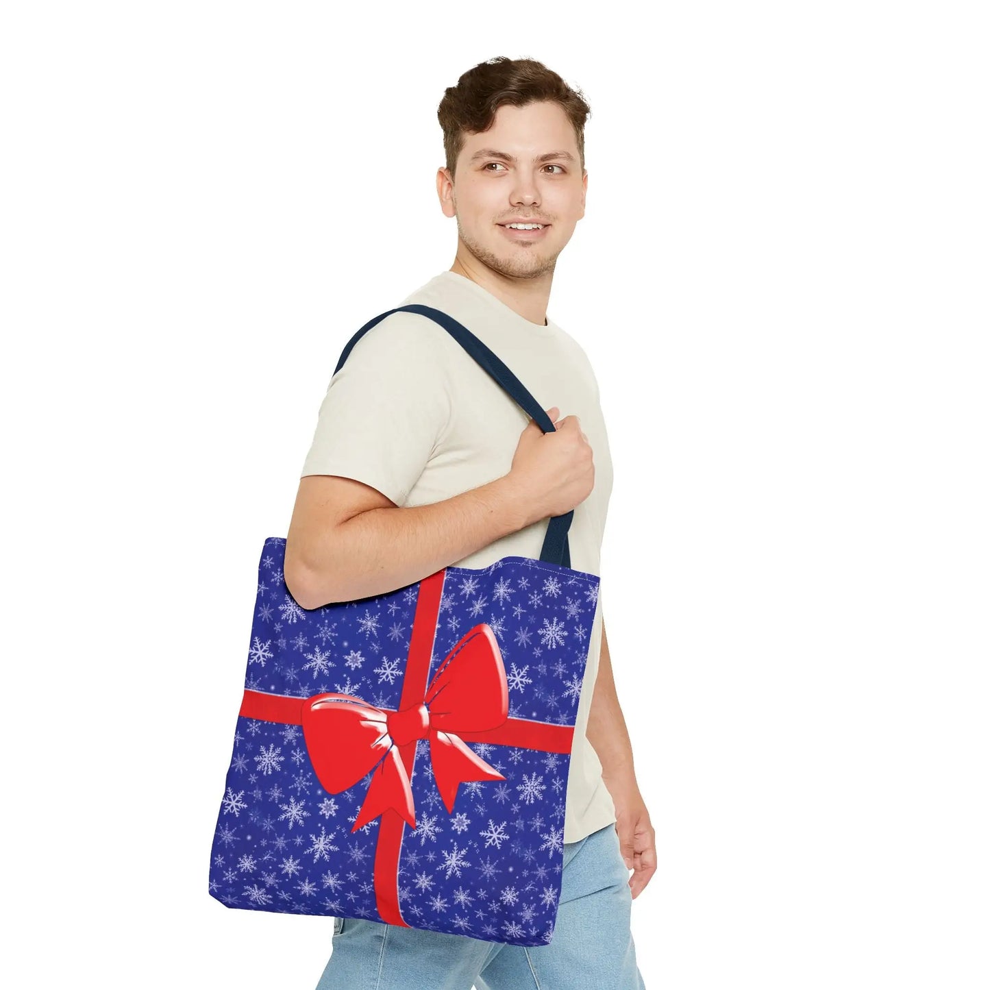 Blue christmas tote bag with white snowflake pattern and red bow, reusable holiday shopping bag with white red blue handles