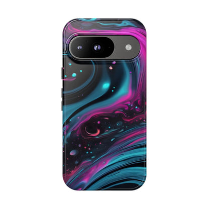 Back of a bold galaxy phone case with vibrant magenta and teal nebula patterns on a tough protective cover