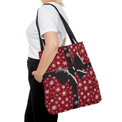 Red holiday tote bag with white snowflake pattern and festive black bow, reusable eco-friendly shoulder bag for xmas shopping