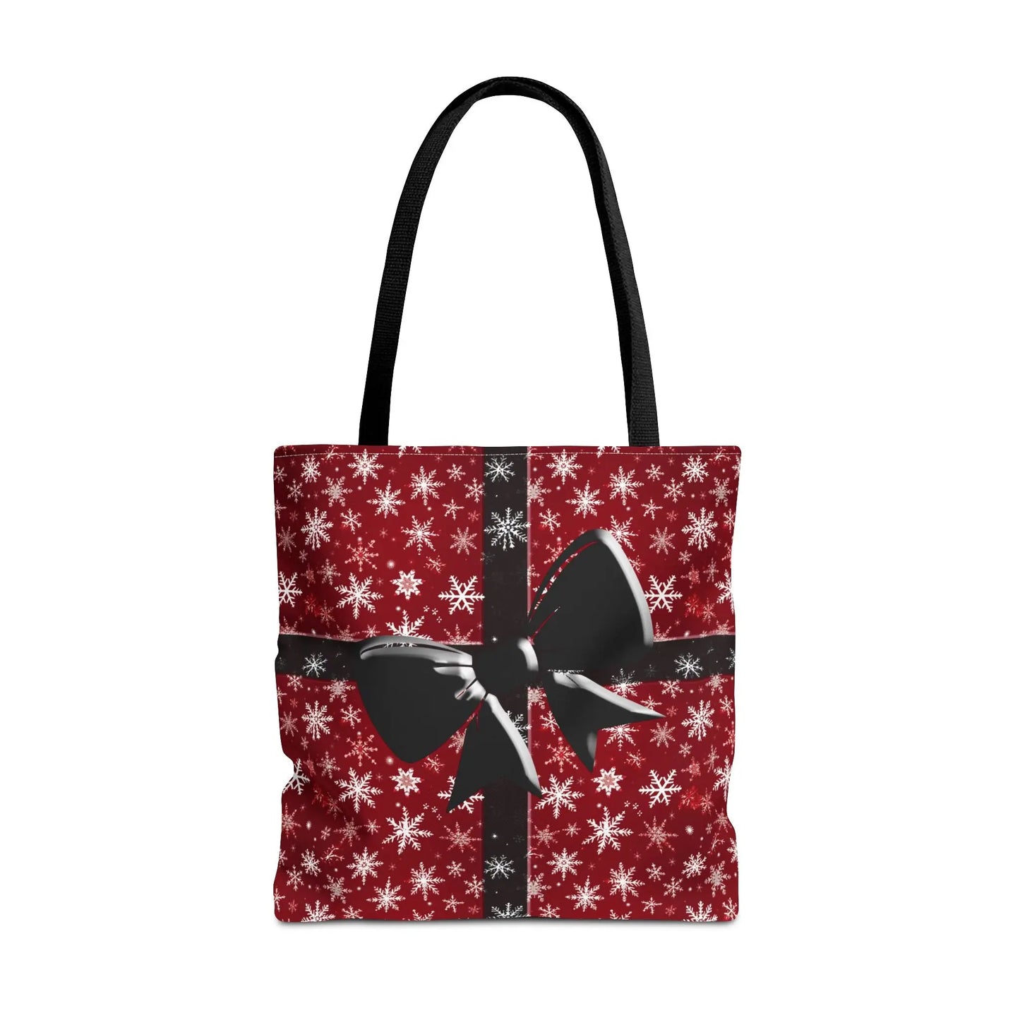 Red holiday tote bag with black handles and festive black bow design on reusable eco-friendly fabric with snowflakes background
