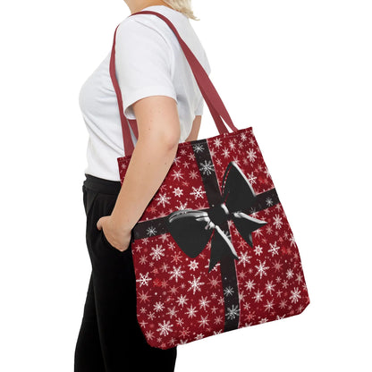Red holiday tote bag with festive black bow and white snowflake pattern reusable eco-friendly shopping carryall