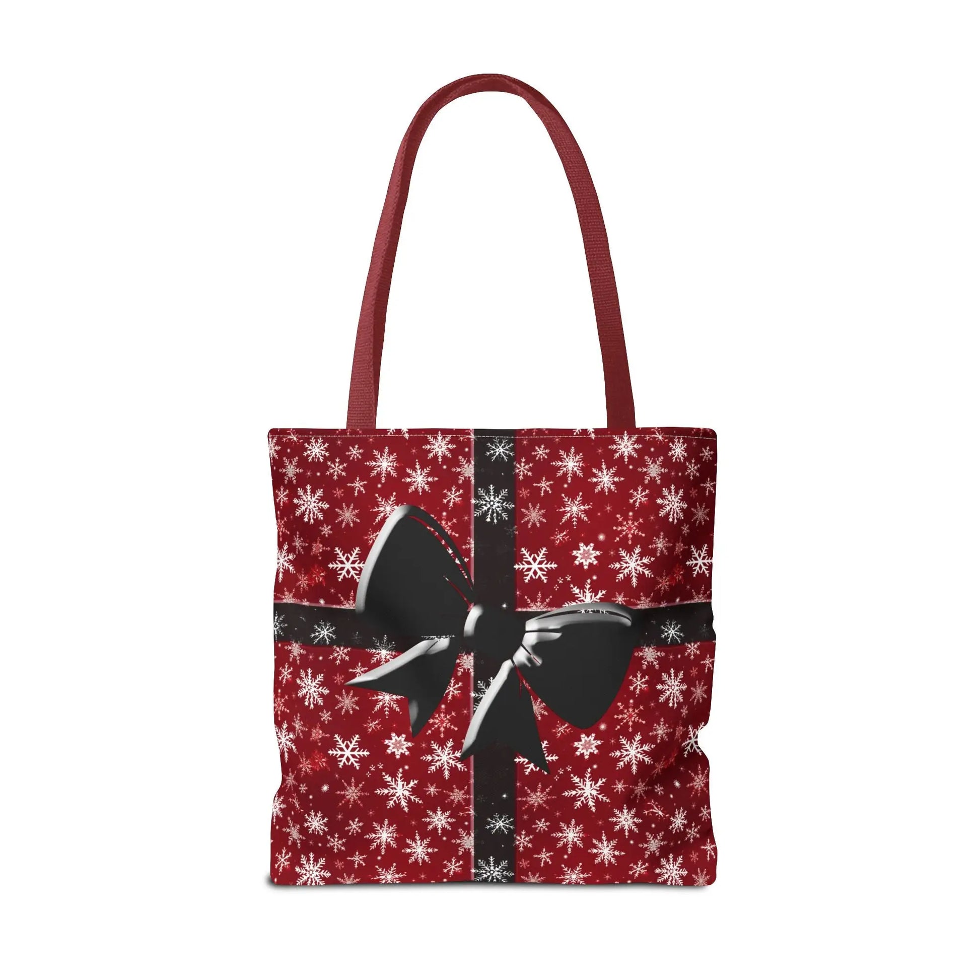 Red holiday tote bag with white snowflake pattern and festive black bow shoulder design for eco-friendly shopping