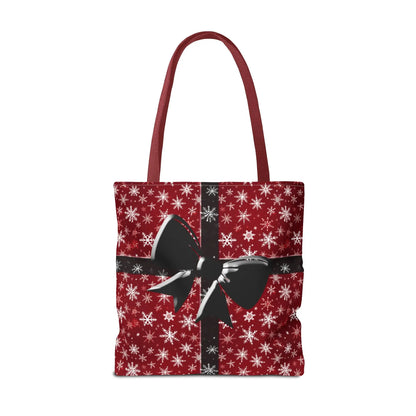 Red holiday tote bag with white snowflake pattern and festive black bow shoulder design for eco-friendly shopping