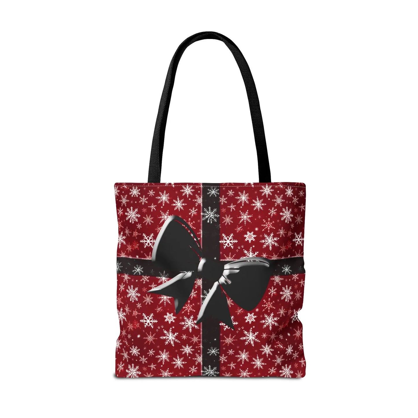 Red holiday tote bag with festive black bow, white snowflake patterns, black handles, reusable eco-friendly carryall