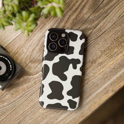 Black cow print phone case with sleek modern design showing back side for protective use and style