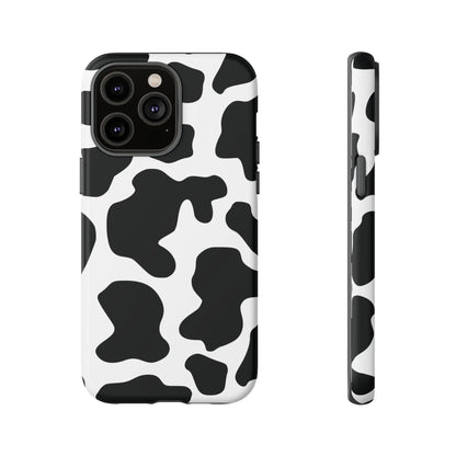 Black cow print phone case with protective cover featuring classic black and white cow print design on back side