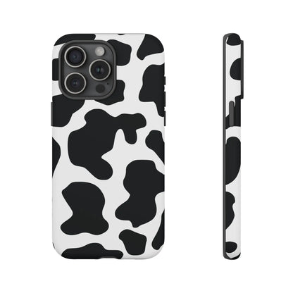 Back side of a black cow print phone case with protective cover featuring a white and black cow print pattern