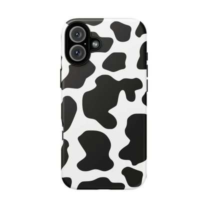 Black cow print phone case showing the back side of a protective print phone case with black and white cow pattern