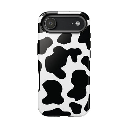 Black cow print phone case showing the back side featuring a protective cow pattern cover in black and white