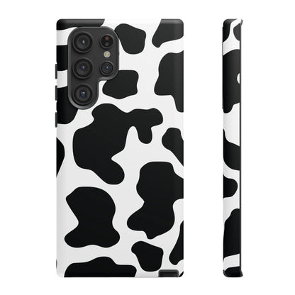 Black cow print phone case with glossy finish showing the back side of the protective cover