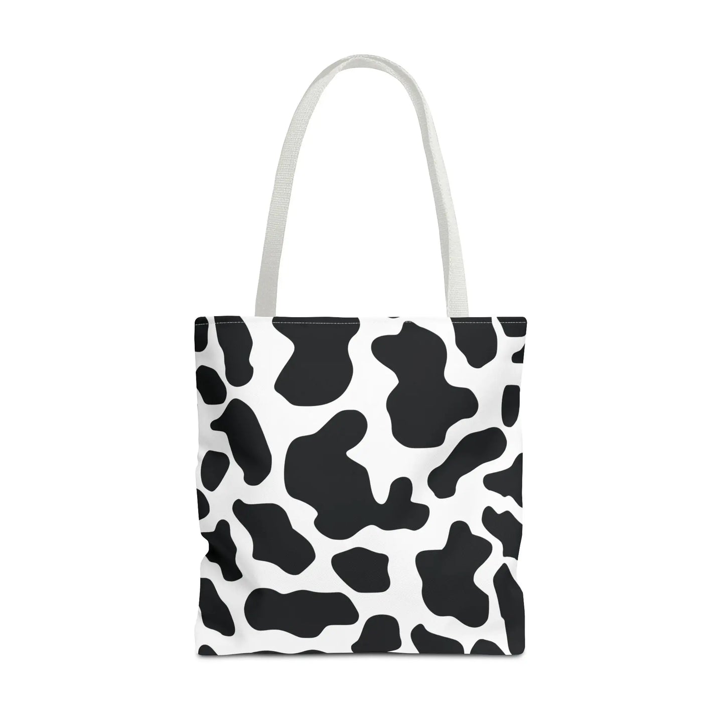 Black and white cow print canvas tote bag with matching handles large reusable cow print tote for shopping and travel