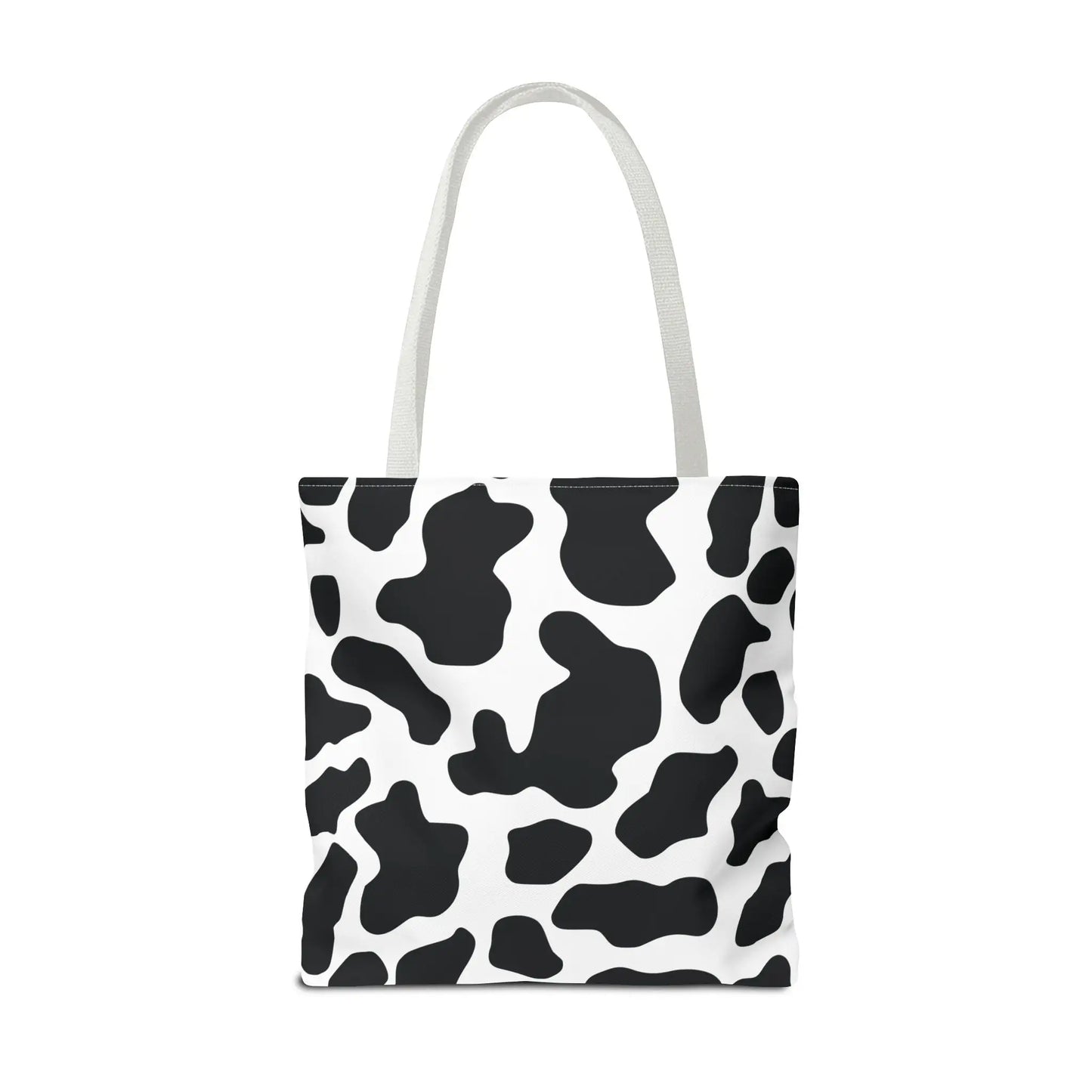 Large black and white cow print tote bag with matching handles reusable for shopping and travel use