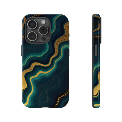 Back of an elegant geode phone protector with deep teal and gold swirling patterns on a dark navy phone protector