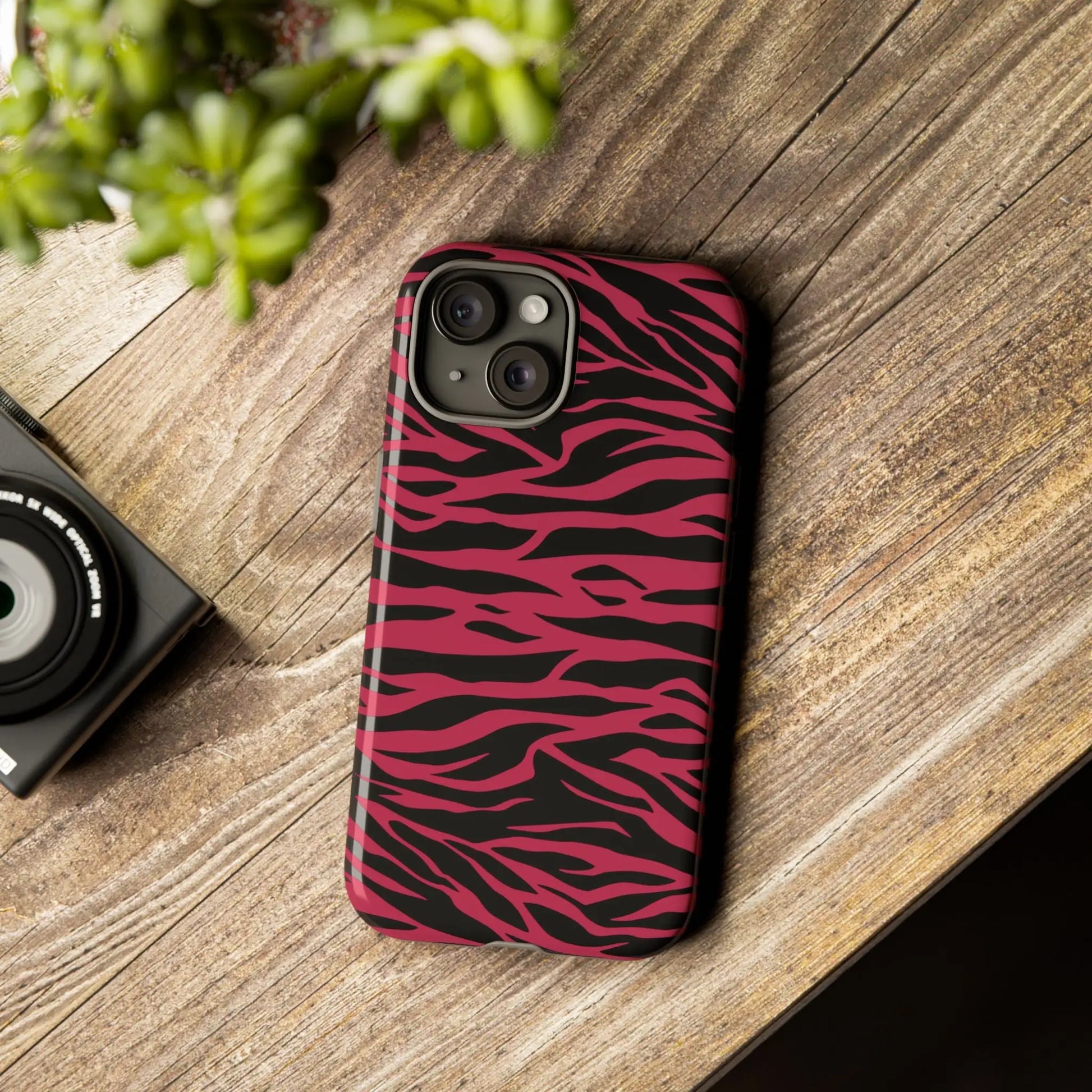 Magenta wild tiger pattern print phone case with vibrant pink and black zebra stripes and sleek protective design back view