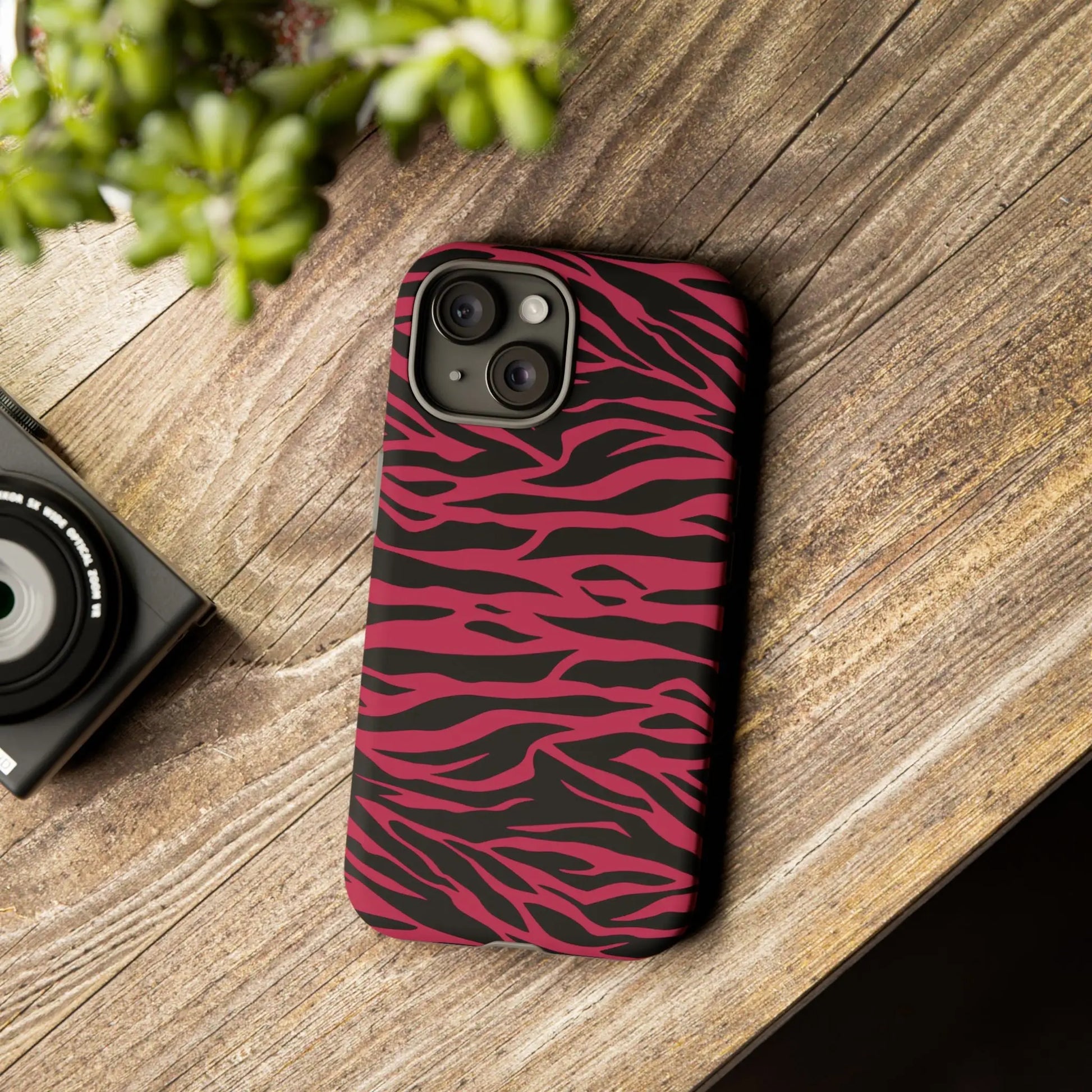 Vibrant pink and black magenta wild tiger pattern print phone case with sleek protective design showing back side