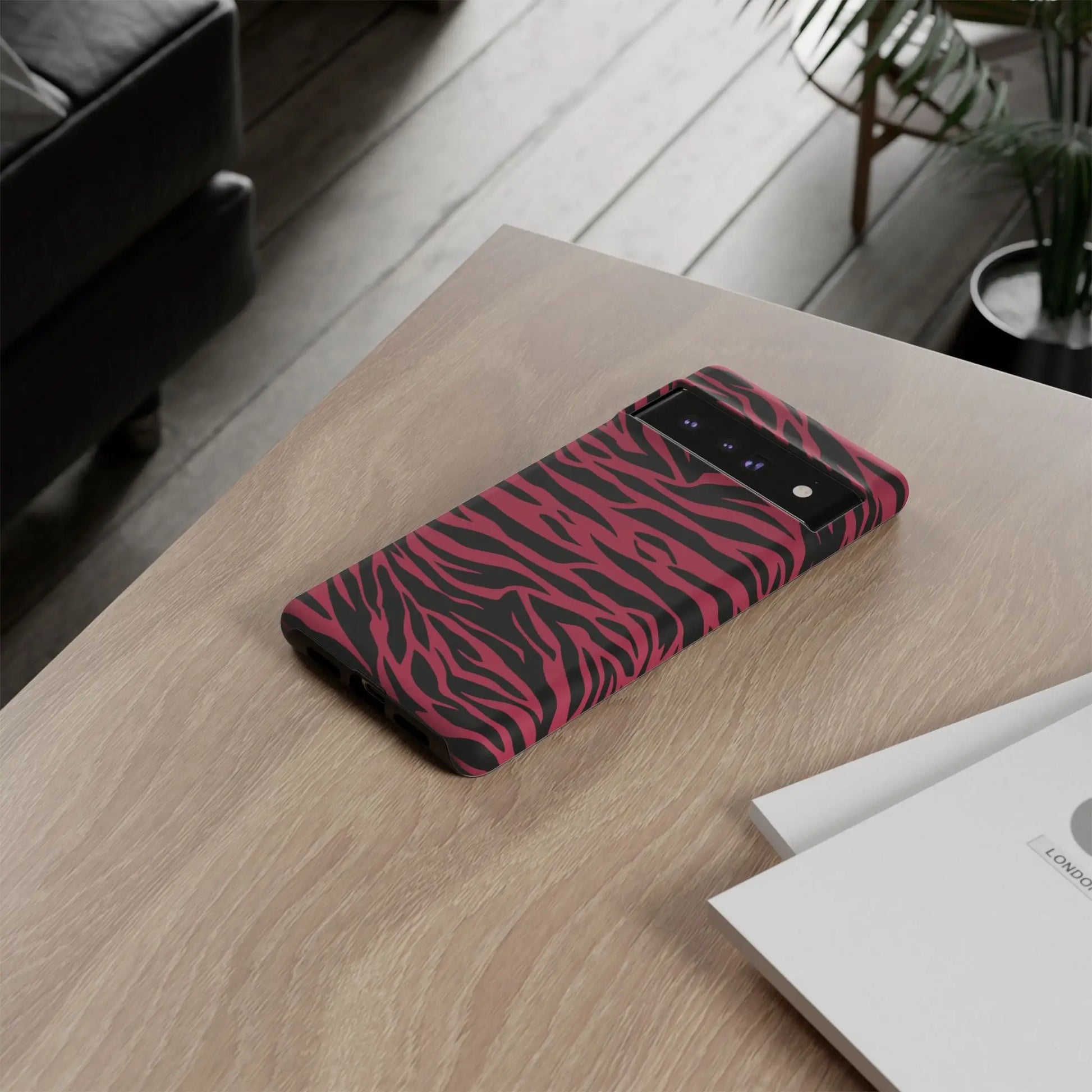 Magenta wild tiger pattern print phone case with vibrant pink and black zebra stripes and a sleek glossy finish back side