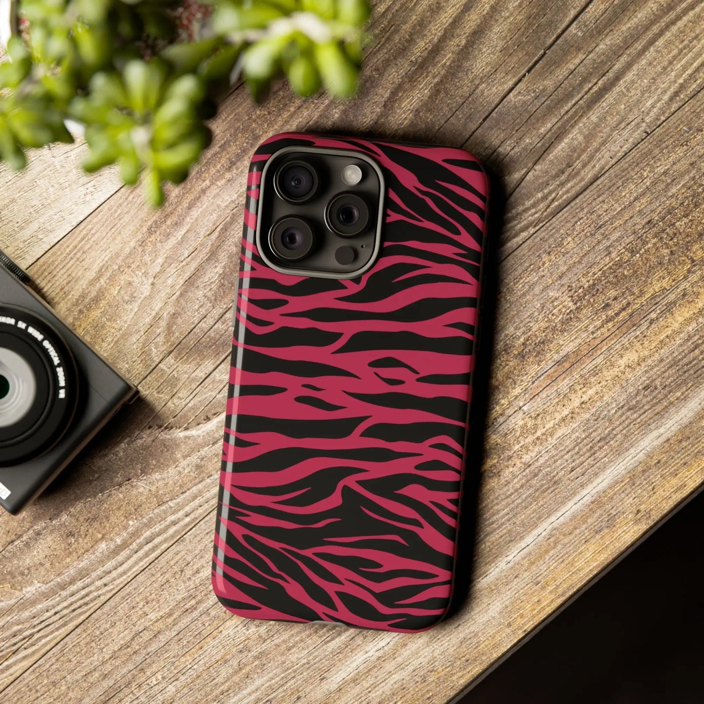 Magenta wild tiger pattern print phone case with vibrant pink and black zebra stripes and sleek protective design back view