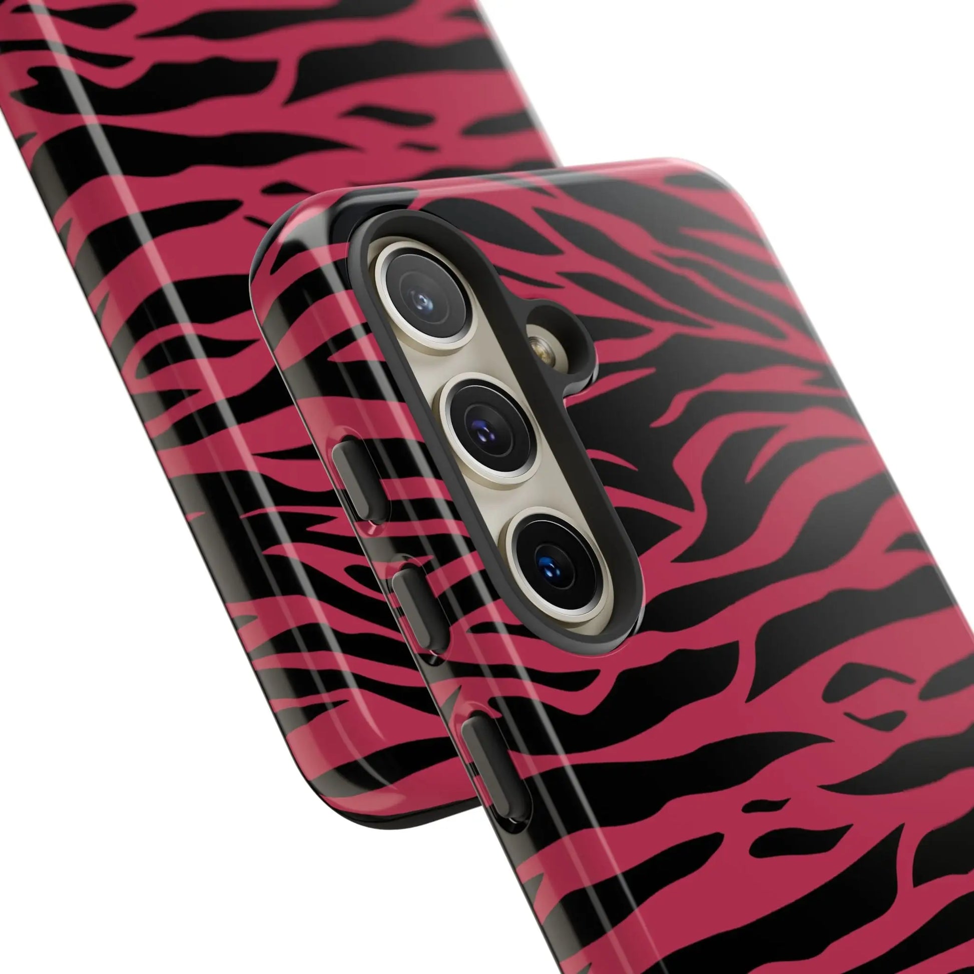 Back of a vibrant magenta wild tiger phone case with black zebra stripes and glossy finish for triple-lens smartphones