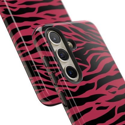 Back of a vibrant magenta wild tiger phone case with black zebra stripes and glossy finish for triple-lens smartphones