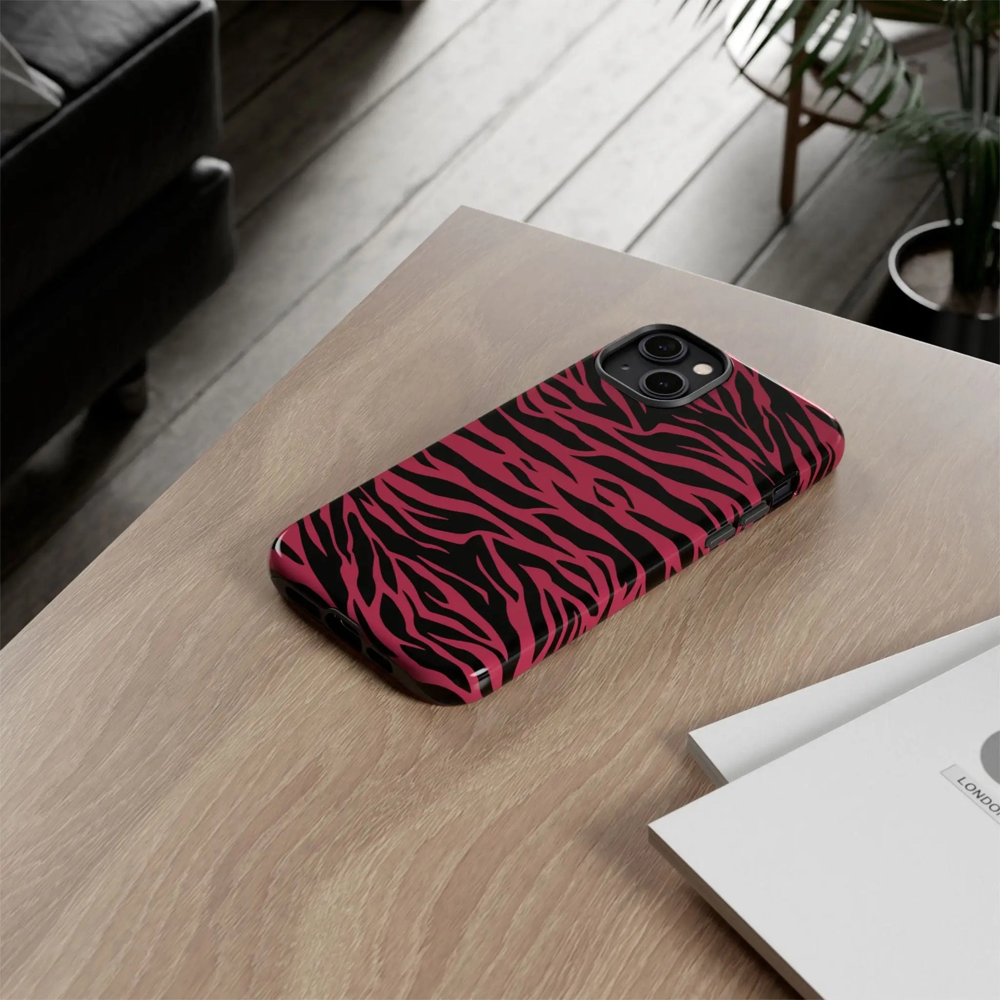 Magenta wild tiger pattern print phone case with vibrant pink and black zebra stripes and sleek protective design back view