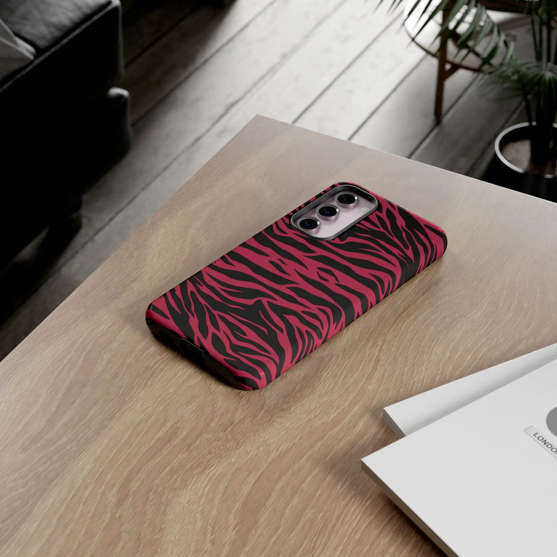 Magenta wild tiger pattern print phone case featuring a vibrant pink and black zebra striped protective design back side