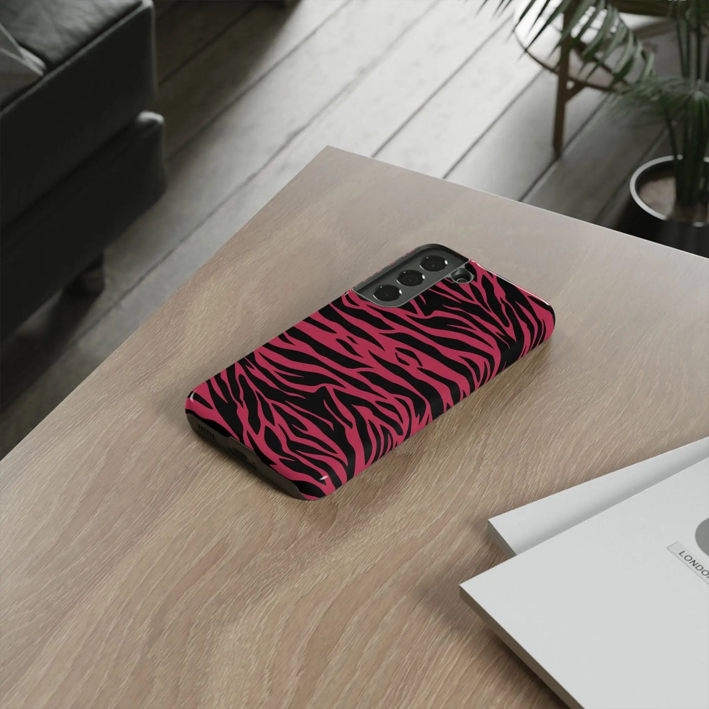 Magenta wild tiger pattern print phone case with vibrant pink and black zebra stripes and sleek protective design back side