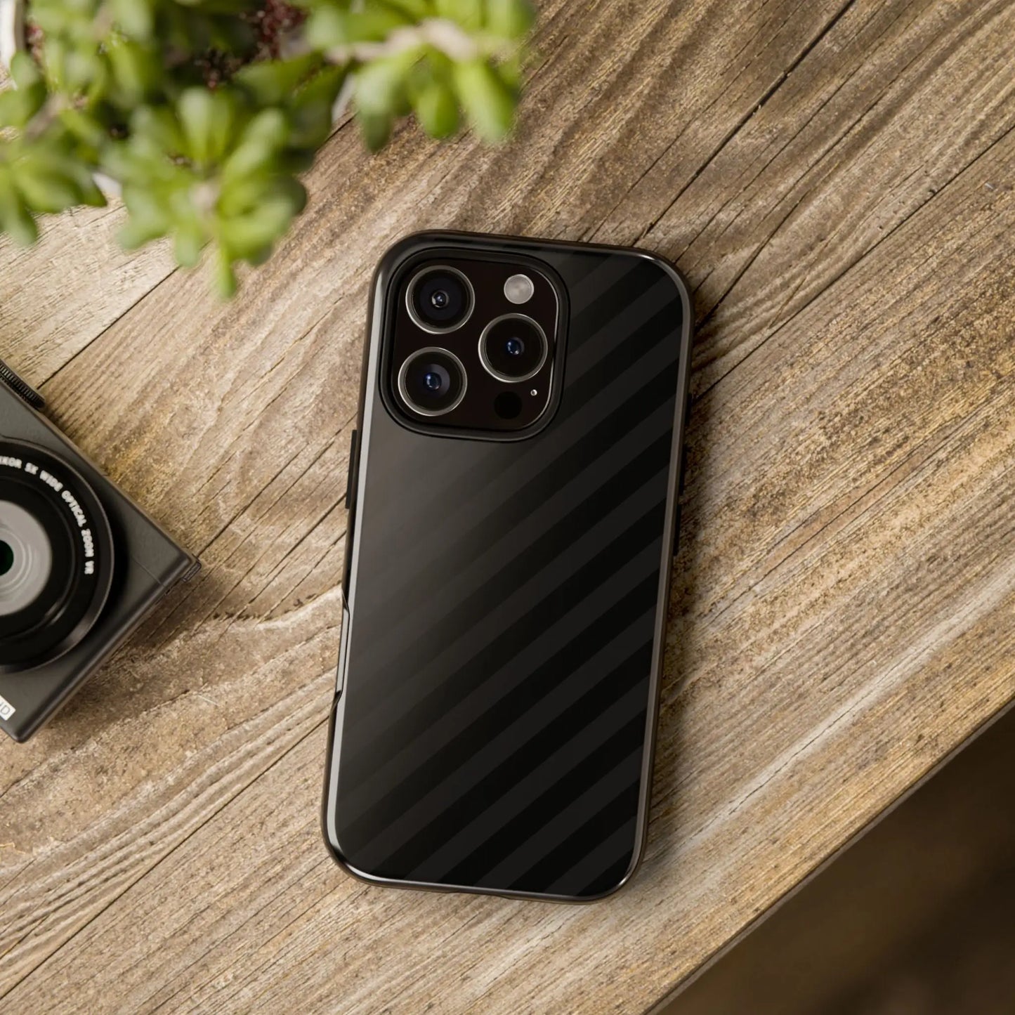 Black smartphone showing back side with diagonal pattern tough gloss finish protective phone case cover