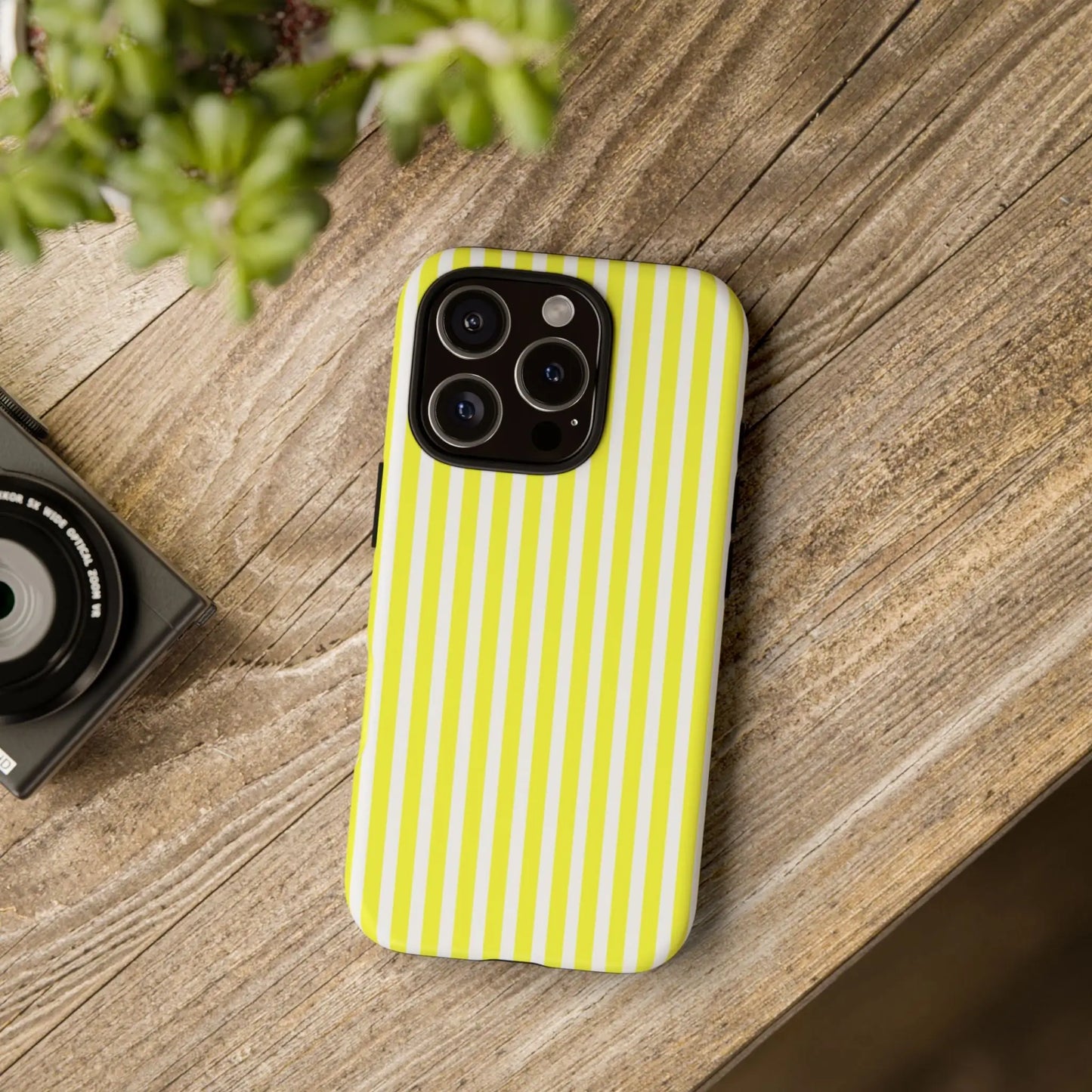 Back side of a banana yellow and white striped tough phone case cover with a hard shell for iphone samsung and google